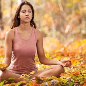 indian-woman-doing-yoga-in-autumn-landscape-1zfew6d4xuanbm9j